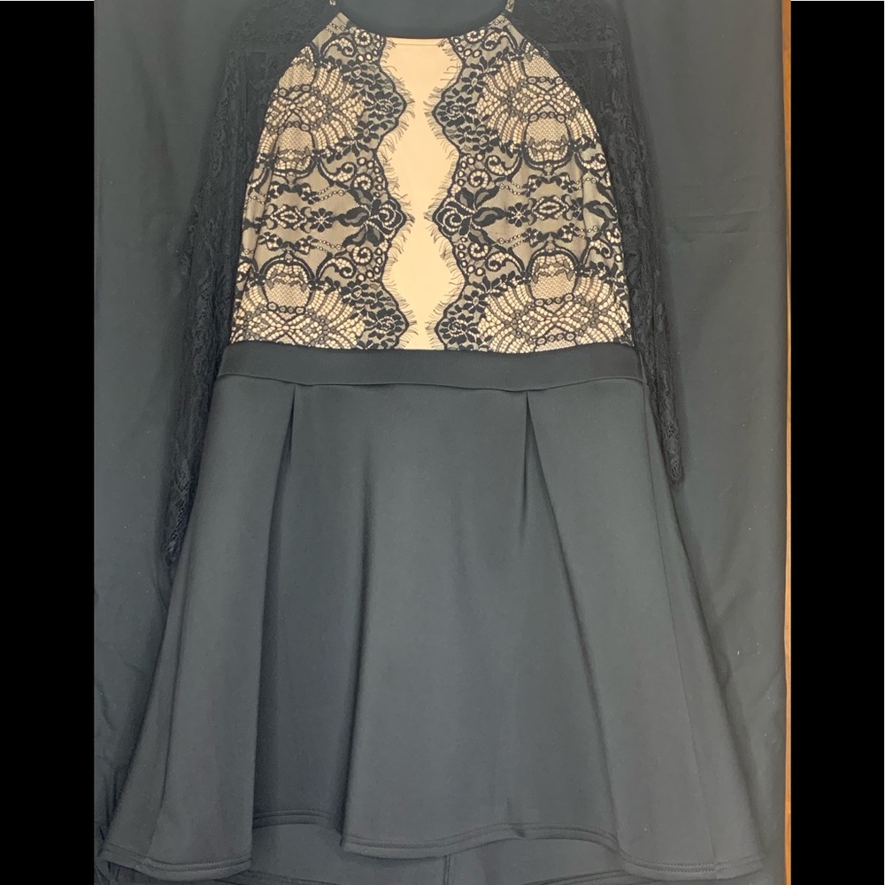 Peplum bottom Lace & Nude long sleeve top.
